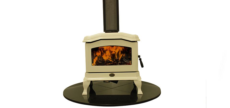 White Kemlan C24 wood burning stove on a stand, one of the best wood heaters for autumn providing efficient home warmth