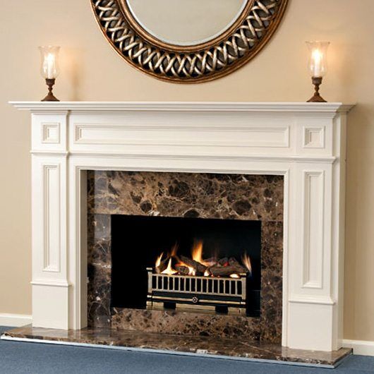 A Real Flame Elegance fireplace with a mirror above, offering warmth and style with modern gas log fires for homes