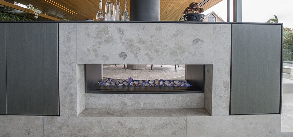 Horizon Low Line double-sided fireplace with glass doors, one of the best gas log heaters for autumn adding warmth on both sides