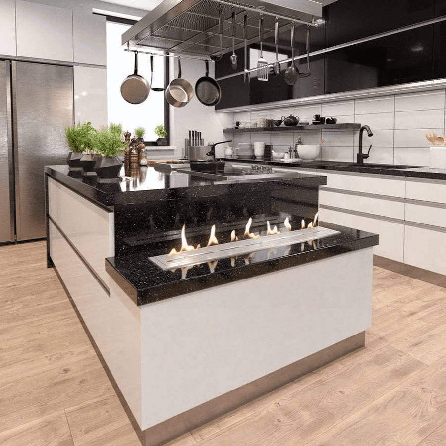 Sleek kitchen with gas stove, sink, and Decoflame Net Zero Fireplace Inserts, featuring modern gas log fires for homes heating