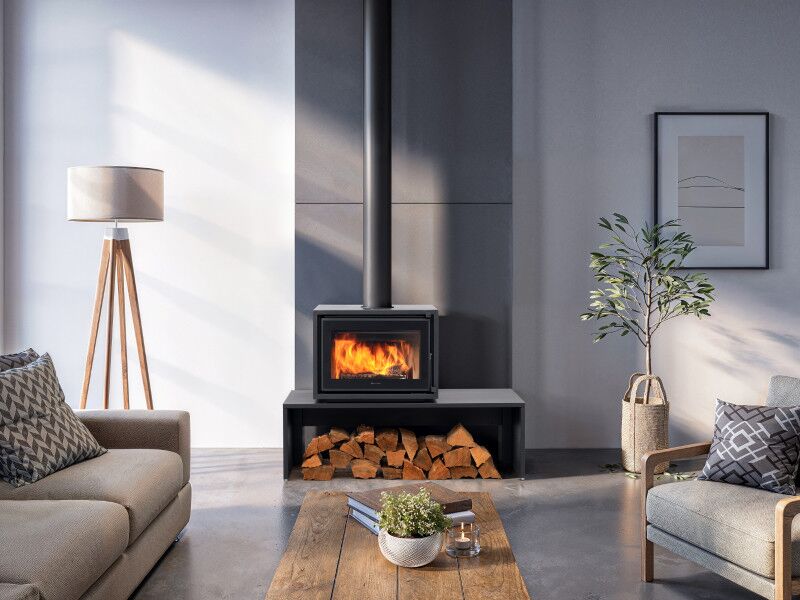 A chic living room with a wood-burning stove, reflecting the sophistication of Regency Bondi Wood Heater Freestanding aesthetics