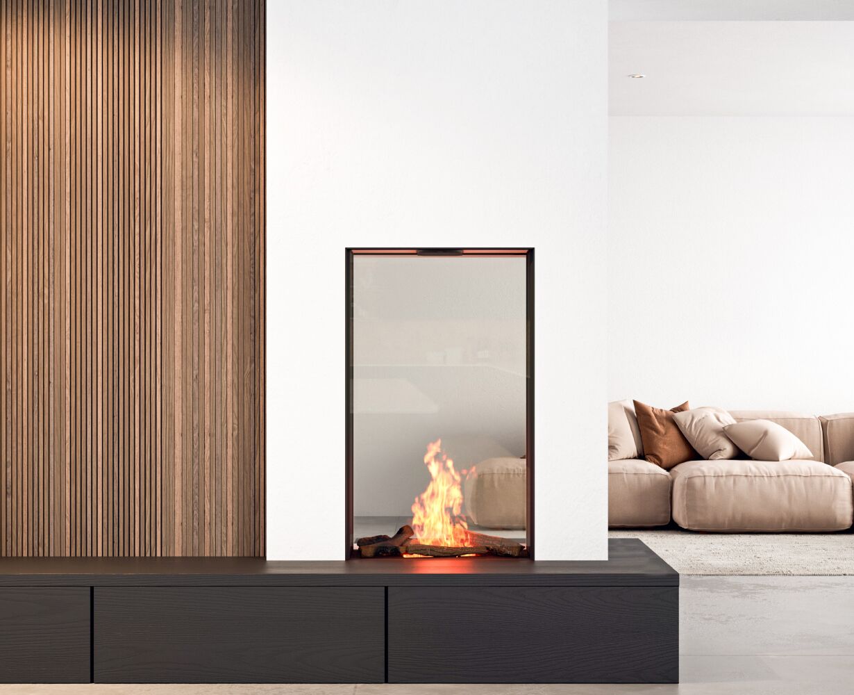 A modern living room with an Element 4 Sky Medium Tunnel Bio Ethanol Fireplace, a sleek couch, and a comfortable accent chair