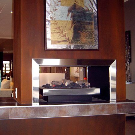 Real Flame Double Vision gas log fire in a modern living room, providing warmth and style for homes with contemporary design