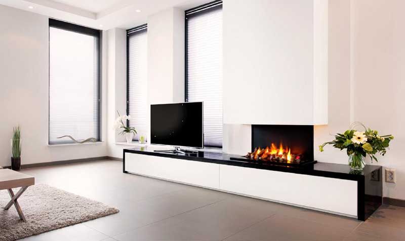 Stylish living room with an Optimyst electric fireplace beside a TV, blending comfort and elegance in modern electric fireplaces for homes