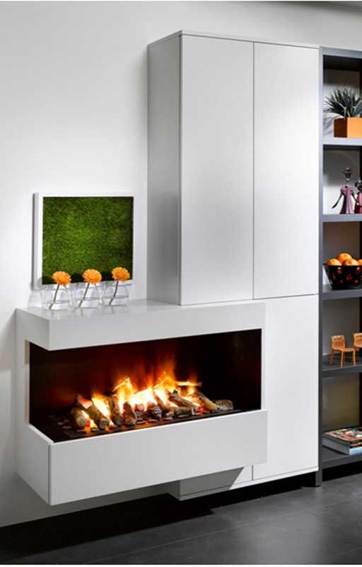 Modern electric fireplaces for homes adding warmth and style, with an Optimyst unit set against elegant white interior walls