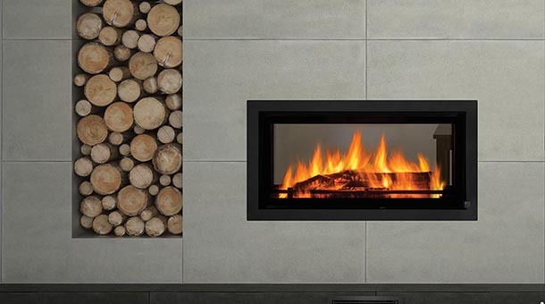 Regency Mansfield wood heater in a modern living room with logs, providing warmth and comfort, one of the best wood heaters for autumn