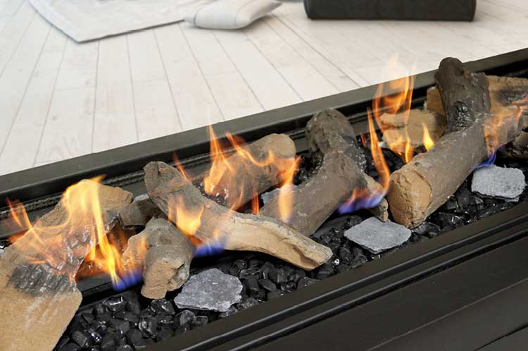 Real Flame Element 1800 DS Gas Fire with glowing flames and logs, accompanied by large coals