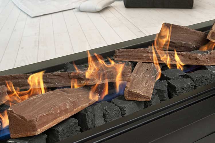 Real Flame Element 1800 DS Gas Fire with realistic logs and flames, with large black coals, creating a warm ambiance