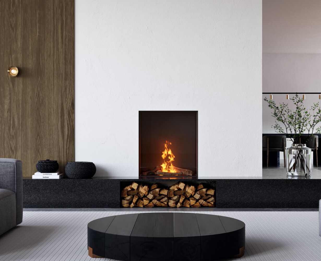 A modern living room featuring a couch and an Element 4 Sky Small Front Bio Ethanol Fireplace for a cosy atmosphere
