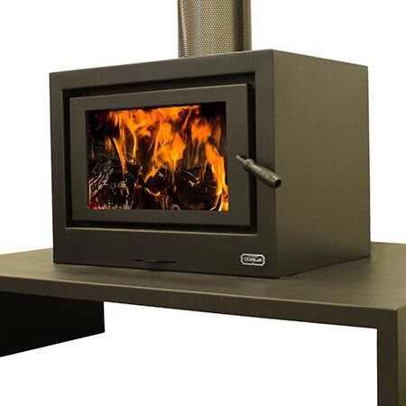 Kemlan Cube wood heater on table, compact and efficient — one of the best wood heaters for autumn