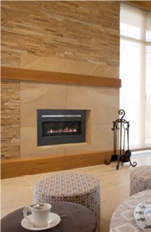 A living room with a Real Flame Element 1200 fireplace and stone wall, one of the best gas fireplaces for autumn warmth