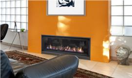 Real Flame Element 1200 installed in a cosy living room with a yellow wall, offering the best gas fireplaces for autumn warmth