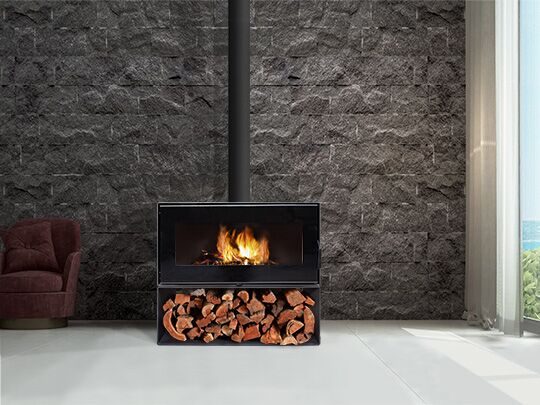 Visionline Taurus Wood Fire fireplace with logs, designed for efficient heating and contemporary aesthetics