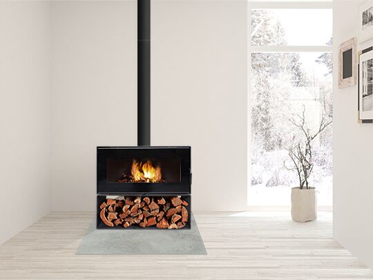 Interior view of a room with a Visionline Taurus wood burning stove beside a window