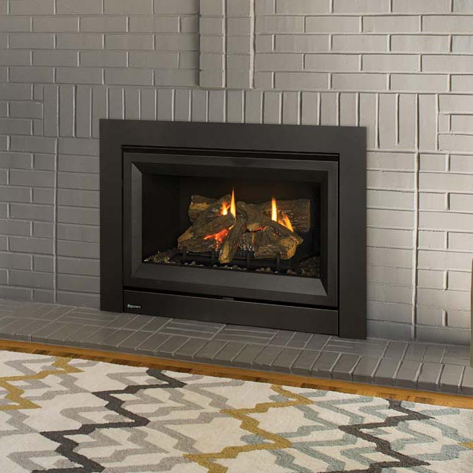Regency DVi34L Gas Fireplace Inbuilt set in a grey brick wall with a bright warm fire