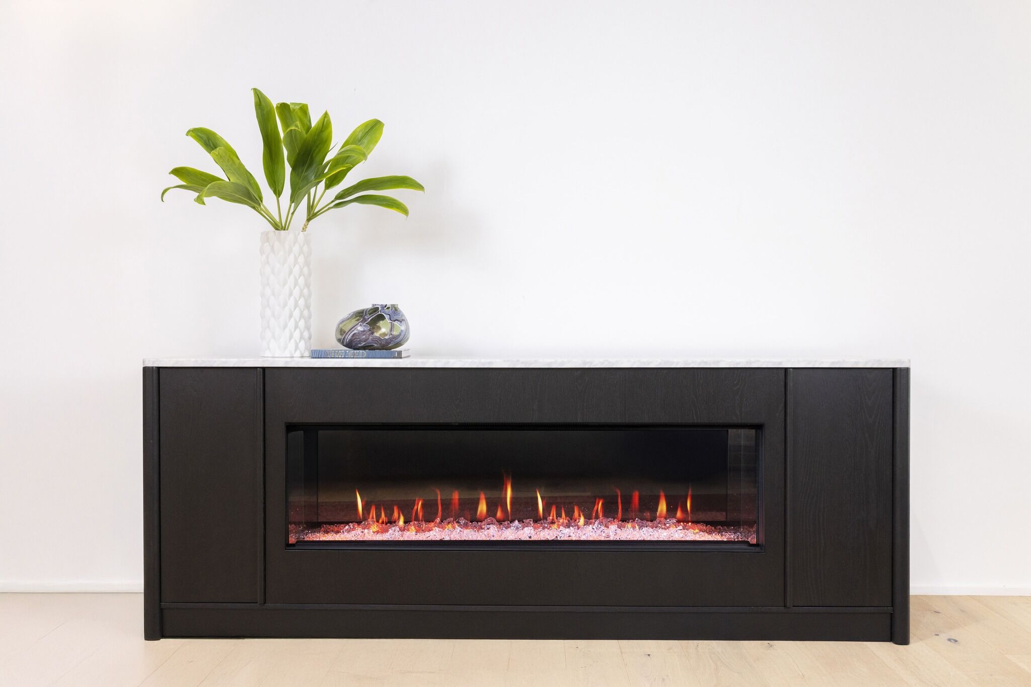 Ember Arc Grange 240 electric fireplace in sleek black with vibrant flames for a contemporary look